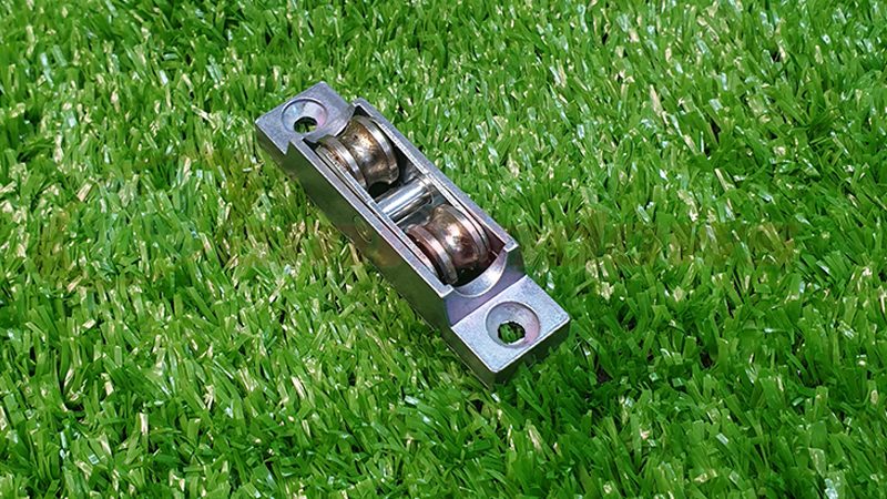 Bánh xe đôi cửa lùa nhựa lõi thép hãng GQ ASSA ABLOY