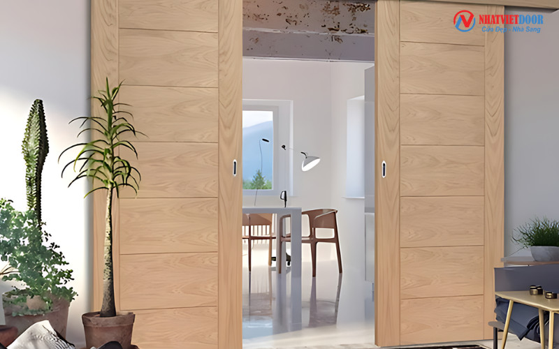 Mẫu cửa lùa bằng nhựa Composite cho phòng khách mang vẻ đẹp hiện đại.